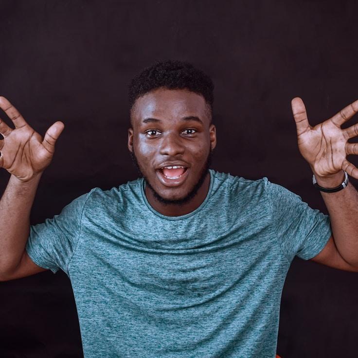 Aarav Desai, Lead Design Curator at Faint Field Aspect, reviewing corporate floral arrangements